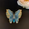 SKEDS Französische Schwere Handwerkskunst Schmetterlingsbrosche Damen Luxus Strass-Insekten-Anstecker Persönlichkeit Eleganter Schmuck Klassischer Schmuck