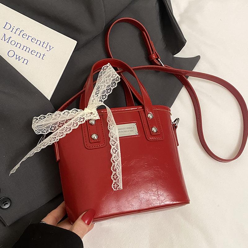 

Весенне-летние хиты, нишевая простая высококлассная портативная сумка-ведро, женская повседневная сумка-мессенджер, универсальная, в милом стиле