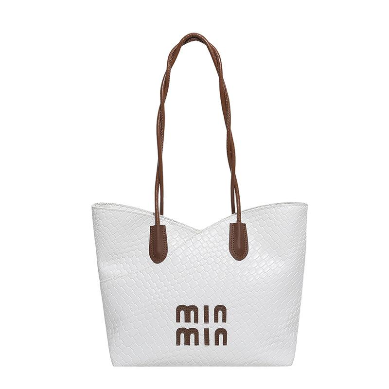 Largecapacity woven bag women's spring new retro simple shoulder underarm bag Korean version portable tote bag
