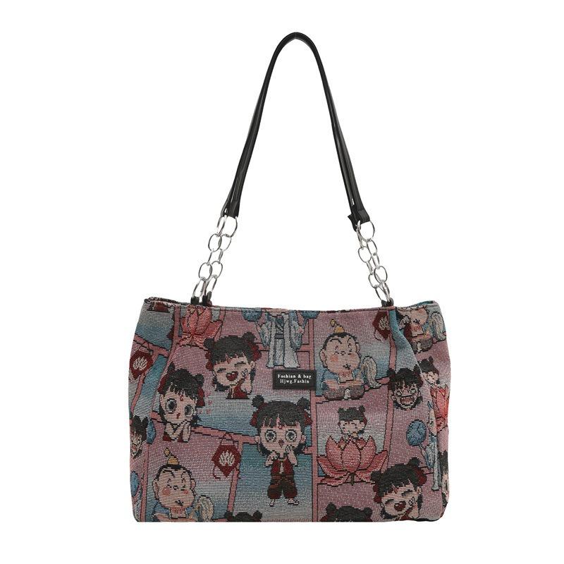

New bag women s bag simple and fashionable cartoon printed women s shoulder bag large capacity tote bag рожевий