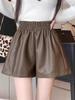 Women's High-Waist A-Line PU Leather Shorts - Brown, Autumn/Winter 2023, Fashionable Slim Wide-Leg Design for Outerwear with Boots.