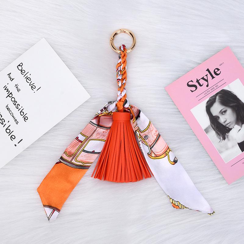 Korean Luxury Leather Bow & Tassel Charm Keychain