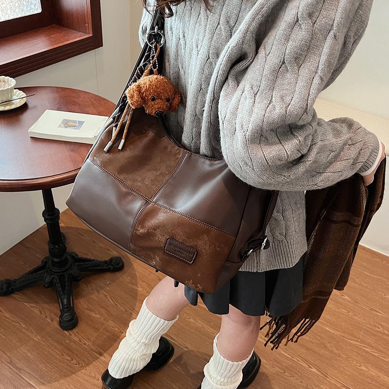 

Женская сумка большой вместимости трендовый рюкзак 2025 новая мода контрастный цвет повседневная универсальная сумка через плечо 32*12*33