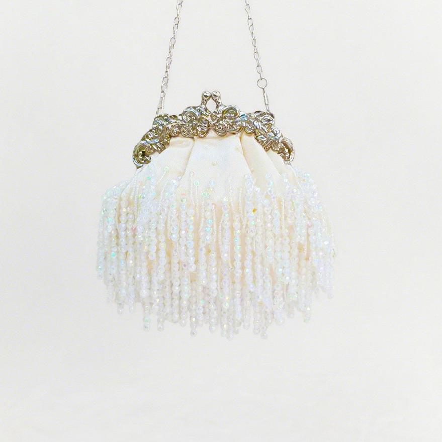 Pochette da sera di lusso con nappe di perline e paillettes con catenina in raso