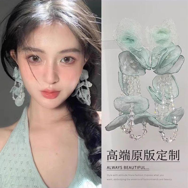 

Taro Love Летние Бессмертные Уникальные Праздничные Серьги-пусеты Нишевые Голубые Цветы Преувеличенные Длинные Серьги Серьги Mint Mambo flower earrings