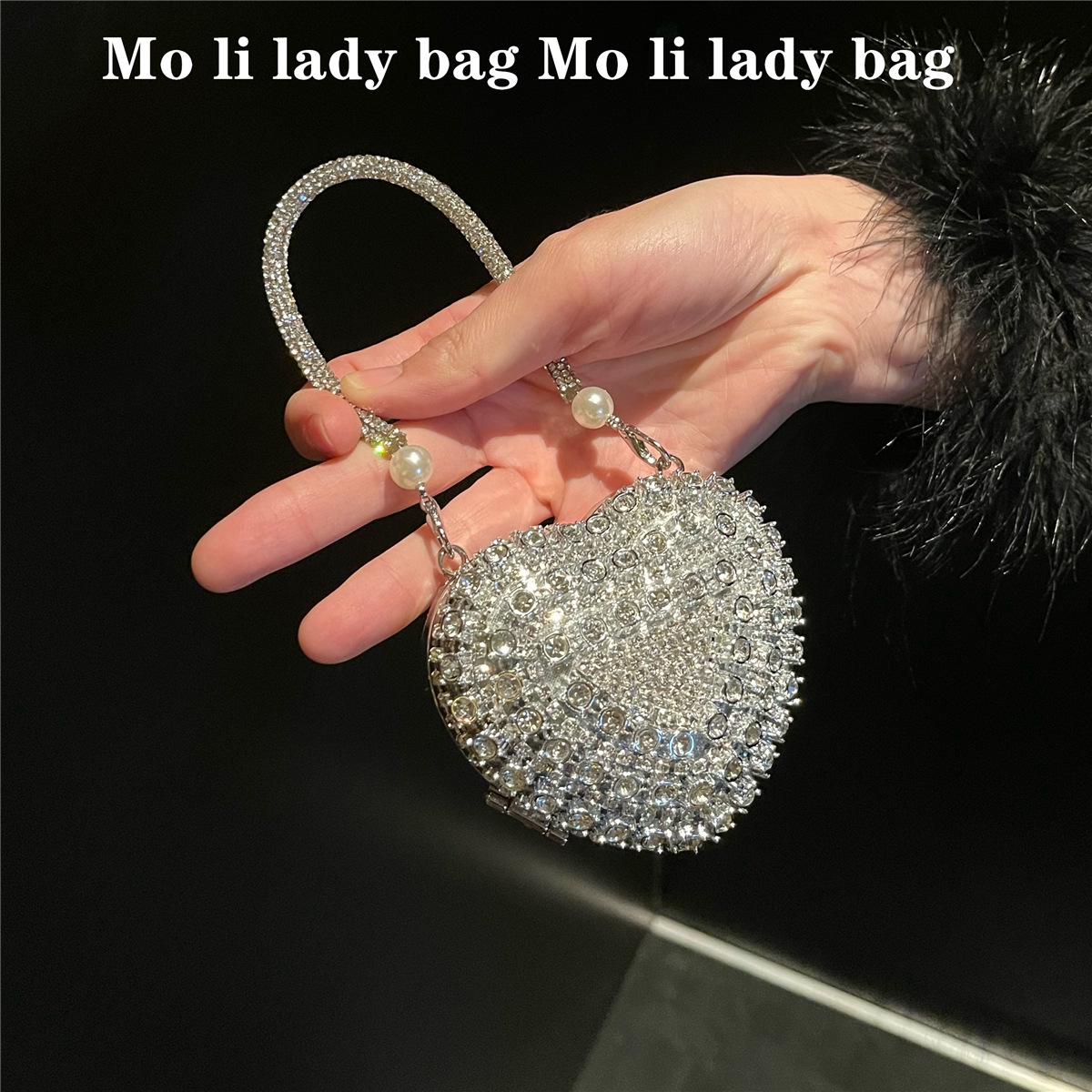 

2024 Ретро Европейская и Американская Мини-сумочка для помады в форме сердца с бриллиантовыми шипами