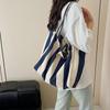 Korean version of casual canvas striped shoulder bag, new large-capacity simple shopping bag, personalized lazy vacation bag
