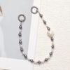 Douyin-Inspired Pearl Phone Chain: Stylish Anti-Loss Pendant with Bow.