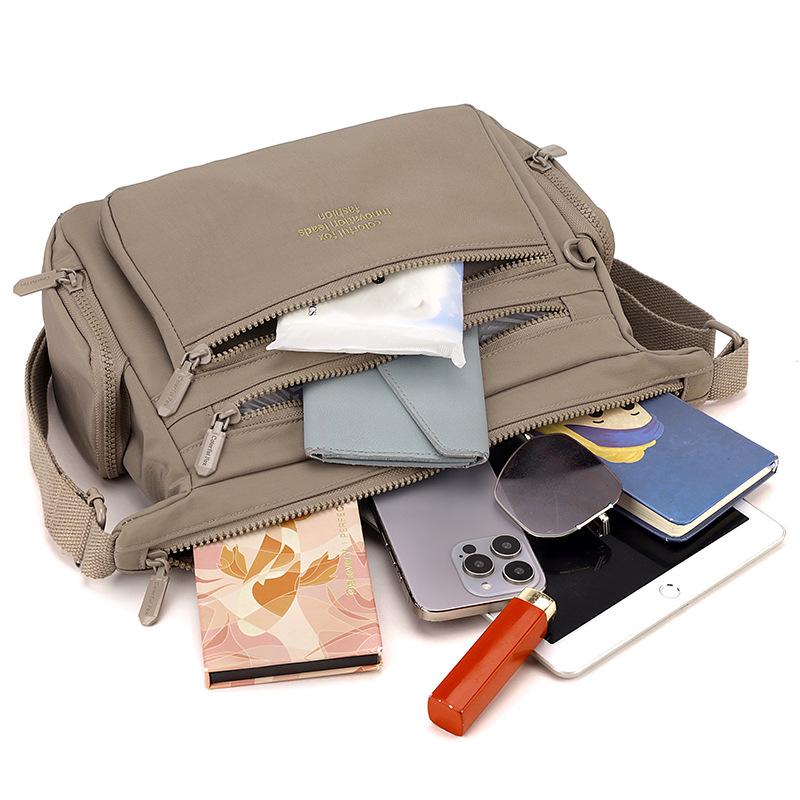 Ny dam stor kapacitet axelväska flerlagers stänkskyddad nylon budväska