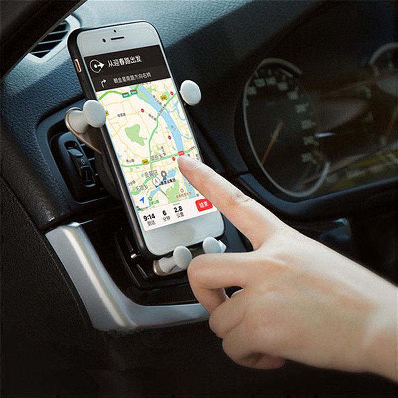 360° drehbarer Cartoon Smiley Gesicht Schwerkraft Auto Halterung Lüftungsschlitz Halter für Mobiltelefon GPS