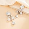 Vintage Metal Pendant Flower Earrings for Women Vacation Stages and Music Festivals Fashion Ethnic Daisy Drop Ear Jewelry Hot Sale Party Gift