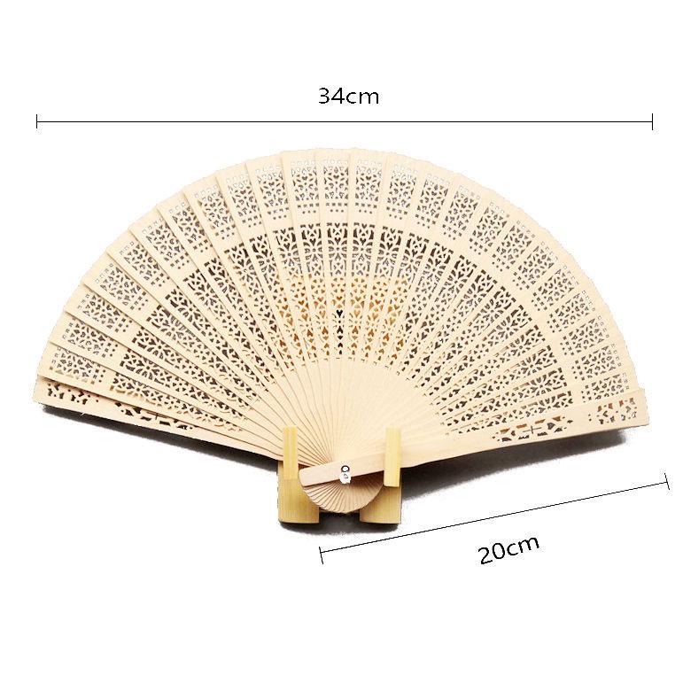 Retro Chinese-Style Sandalwood Folding Fan - All-Wood Hollow Design for Women's Daily Use
