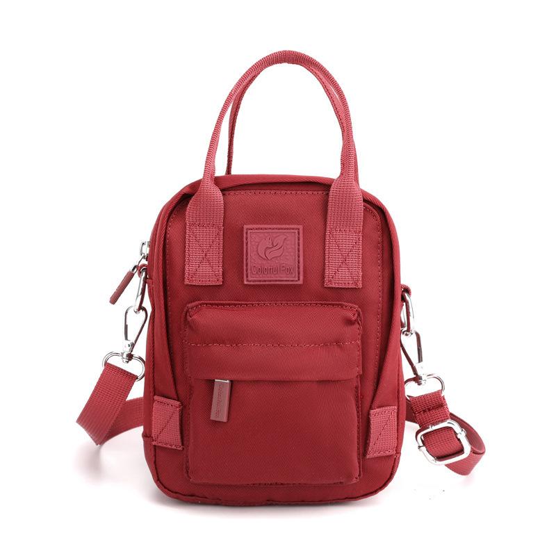 A women's fashion trend messenger bag with simple personality Mobile phone bag Anti-splashing nylon messenger bag