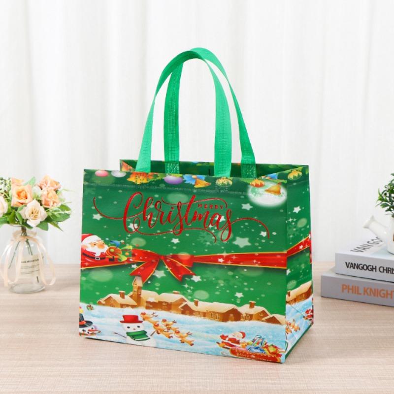 Borsa regalo di Natale Borsa per imballaggio regalo di caramelle in tessuto non tessuto di grande capacità con pupazzo di neve e design di Babbo Natale
