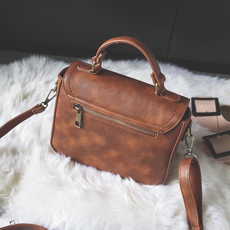 2025 new small square bag retro style portable bag retro lock popular women's bag simple small bag
