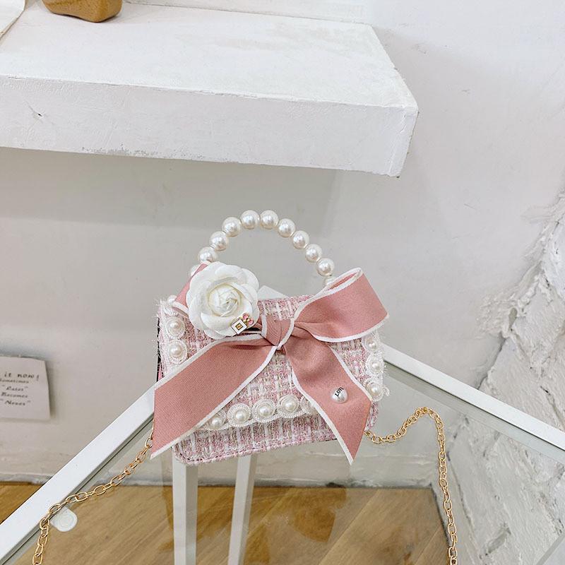 Stylish Mini Girls Handbag With Pearl Bow Design For Fashionable Princesses In Black And White Colors