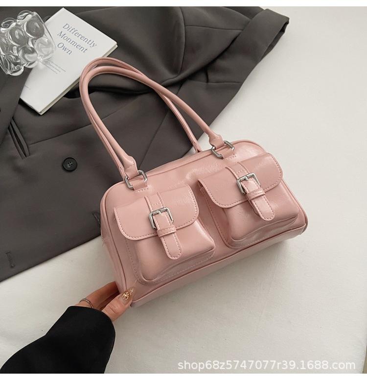 

Niche design portable bowling underarm bag women s 2025 spring new large-capacity fashion shoulder pillow bag розовый