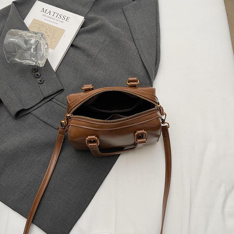 New niche popular simple solid color double pull portable shoulder messenger women's bag