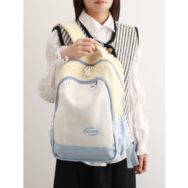 Small fresh and high-value backpack, new trendy large-capacity contrasting color, junior and high school student schoolbag