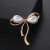 New temperament pearl bow brooch alloy diamond-encrusted brooch anti-light multi-functional large pin