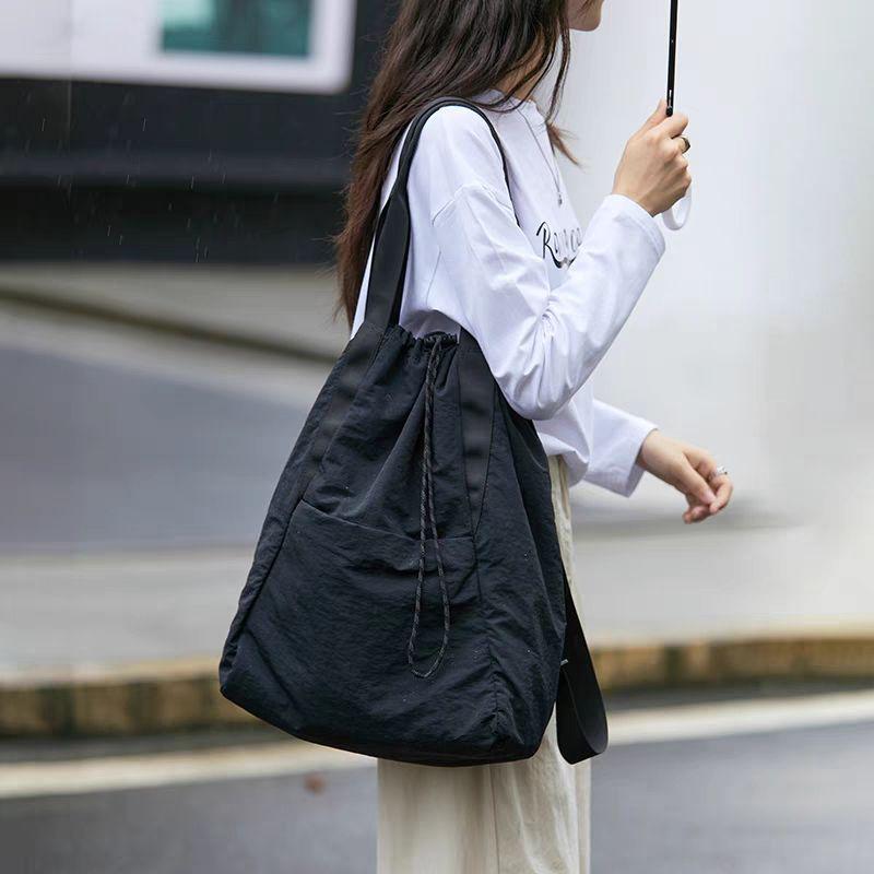 

Women s Waterproof Nylon Drawstring Backpack - Large Capacity Sport & Yoga Shoulder Bag