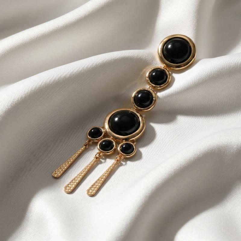 Palace style black resin inlaid with hammer patterned tassel chain earrings, suitable for daily use, parties, and photo shoots