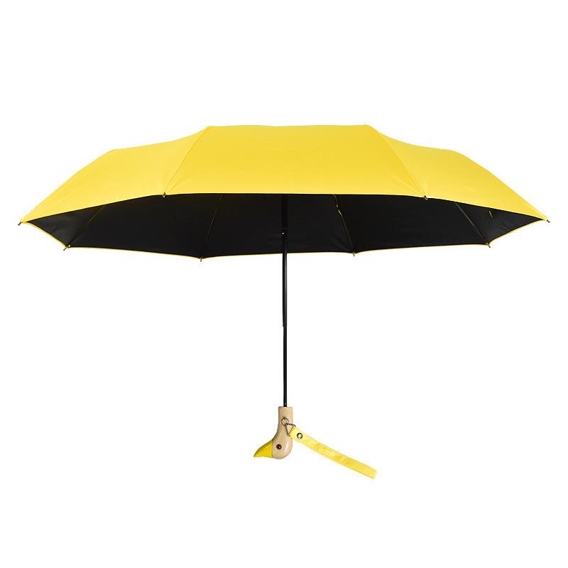 Cute Three-Fold Duck Head Umbrella: Cartoon Design, Wooden Handle, Solid Color for Rain or Shine.