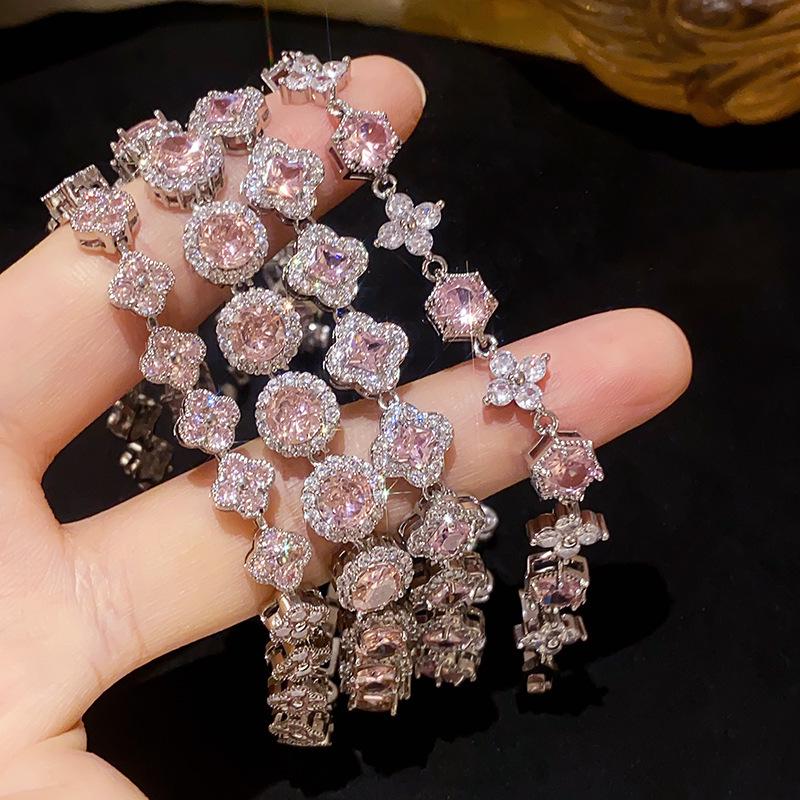 Pink Diamond Zirconia Starburst Flower Bracelet: Trendy, Luxurious Jewelry with Unique Design.