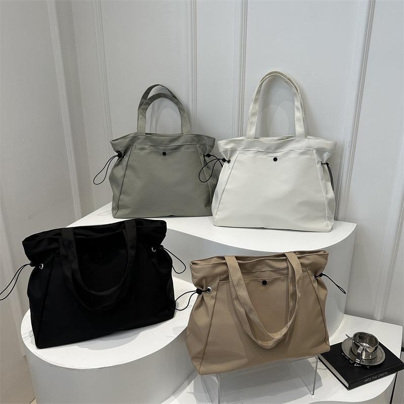 Canvas bag women's new model, popular this year, large-capacity tote bag, summer versatile shoulder class commuter bag