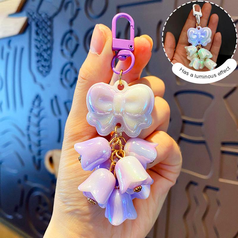 

1 шт. Брелок з акрилового матеріалу. Стильний багатофункціональний дзвіночок. Світиться брелок із квіткою орхідеї.