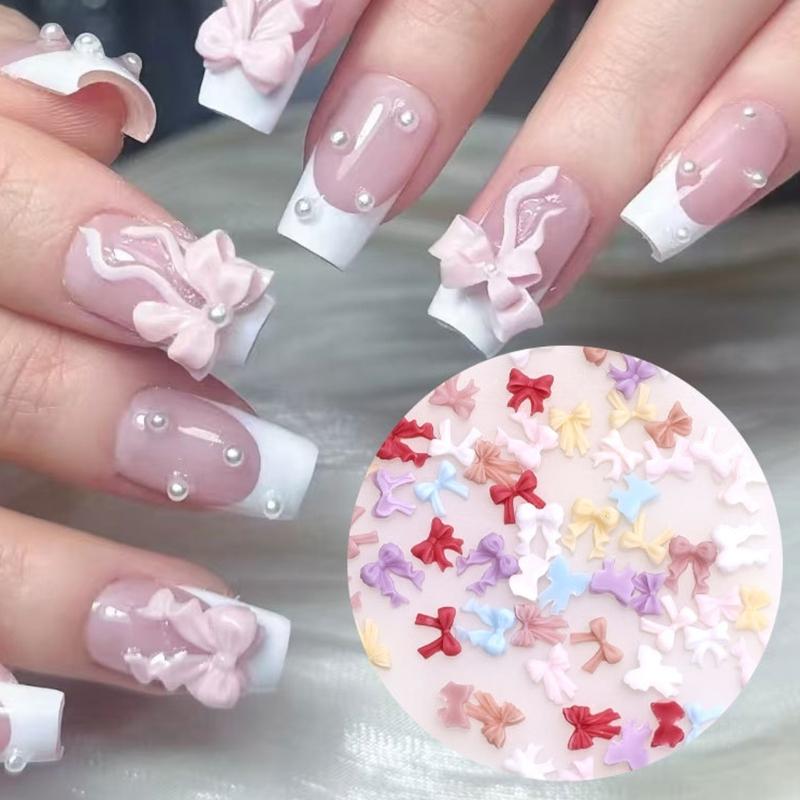 50 Stück Schleifen Nagelanhänger Einfache Schleife Nagelkunst Dekorationen Schleifen Designs Nagelzubehör Harzschleifen Nagel Strasssteine Geschenke