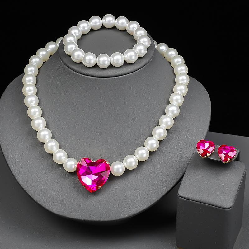 4pcs Haute Minimalist Bridal Set Euro-American Heart Zircon Plated Zircon Necklace Bracelet Earrings for Modern Weddings