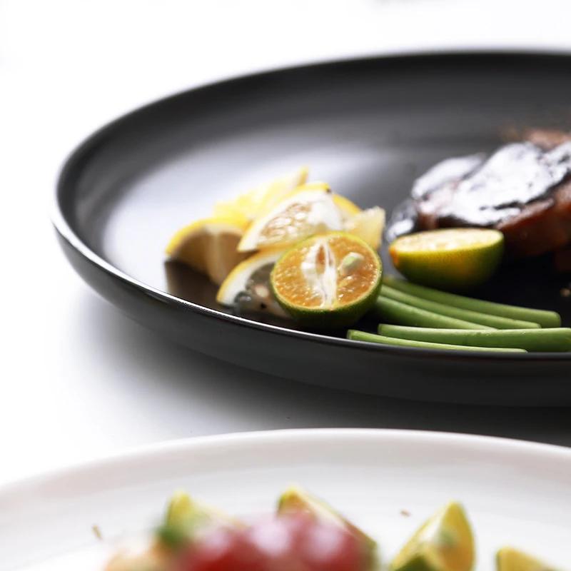 10 Zoll Keramik schwarz-weiß Western-Stil Steakplatte Kommerzielles Geschirr Modernes Haushalts-Rundes Sushi-Salat-Teller