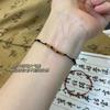 На Xiaohongshu есть такая же плетёная верёвочка для руки с бамбуком, плетение из косточек оливы красной нитью, подарки на запястье подругам, выпускной экзамен