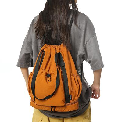A Lightweight College Student Schoolbag with Drawstring and Single-shoulder Handle