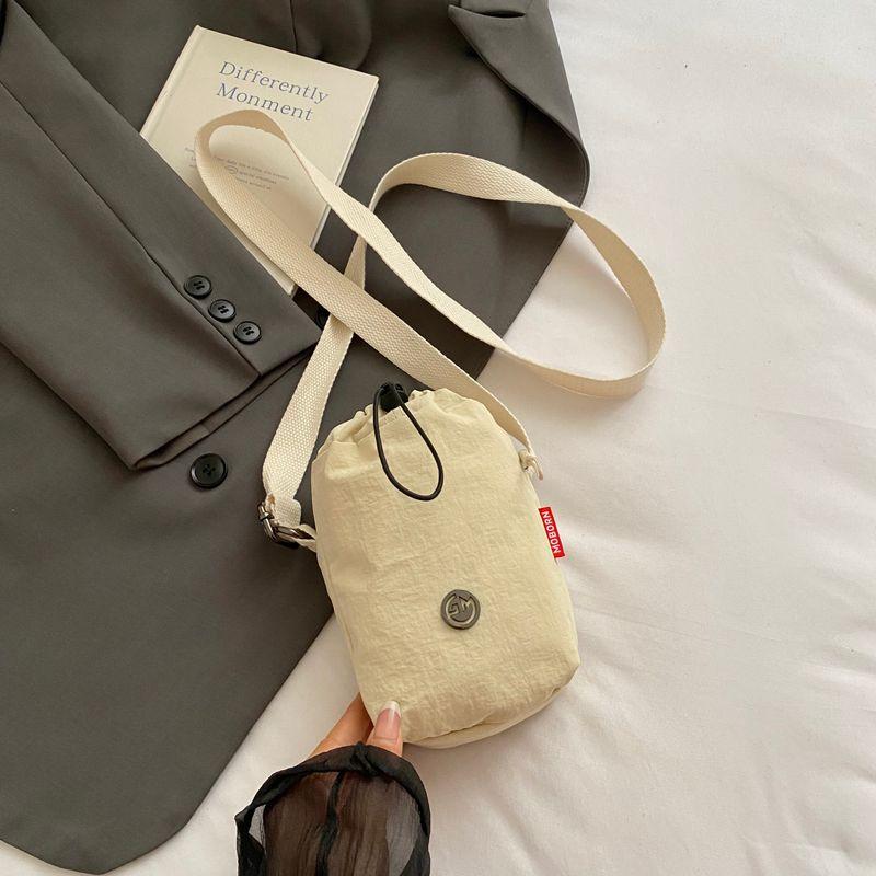

Summer Summer Lightweight Water Cup Small Bag Female 2025 New Arrival Casual Sports Nylon Kettle Bag Crossbody Phone Bag