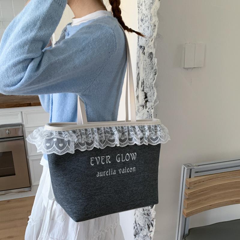 

2025 new niche cute playful high-end lace handheld canvas bag student shopping bag tote bag чёрный
