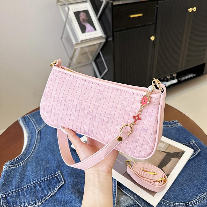 

This year s popular small bags 2025 autumn new Korean version of fashion woven bags women s shoulder crossbody armpit bag tide рожевий