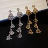 Vintage Metallic Tassel Earrings: Distressed Ethnic Style for a Unique, High-End Look