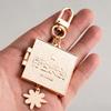 BTS Portachiavi Libro "Permission to Dance", Ciondolo in Metallo Inciso Bangtan Boys con Fiore, Accessorio Borsa per Fan Kpop ARMY