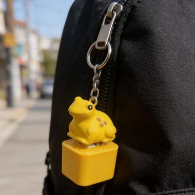 Dekompressionsspielzeug Frosch Quakender Fidget Schlüsselanhänger Wiederaufladbarer Frosch-Clicker mit Realistischen Geräuschen Tragbares Stressabbau-Spielzeug