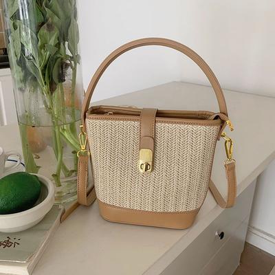 Koreanischer Ins Lässiger Gewebter Stroh Gewebter Beutel Damen Neuer Urlaubsstil Modische Handheld Crossbody Bag Eimerbeutel