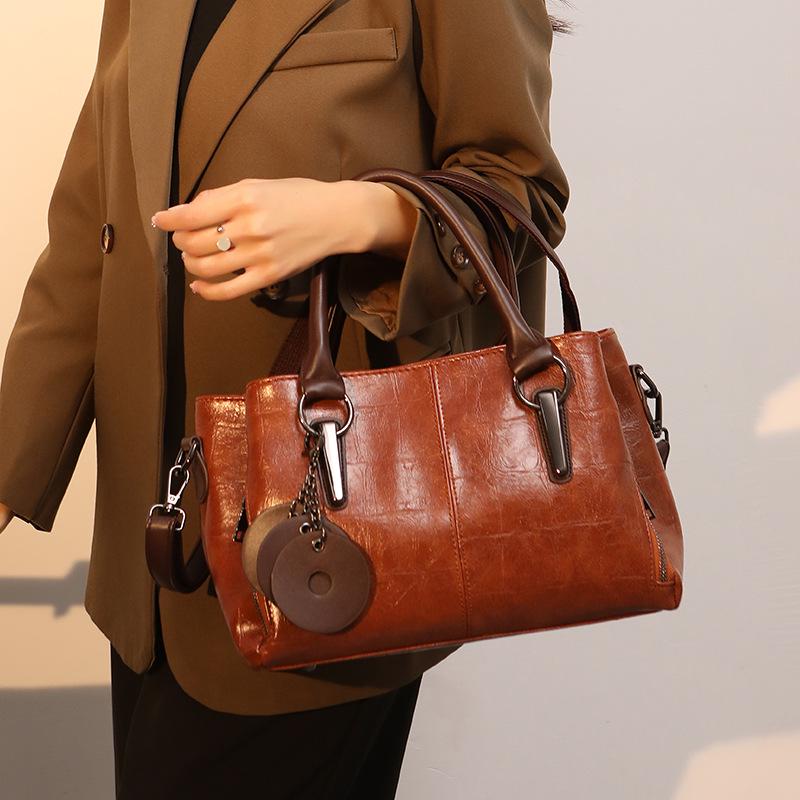 

Гонконг 2025 Ретро Колорблок Ручная Кроссбоди Большая Вместимость Сумка-Подушка для Женщин коричневый