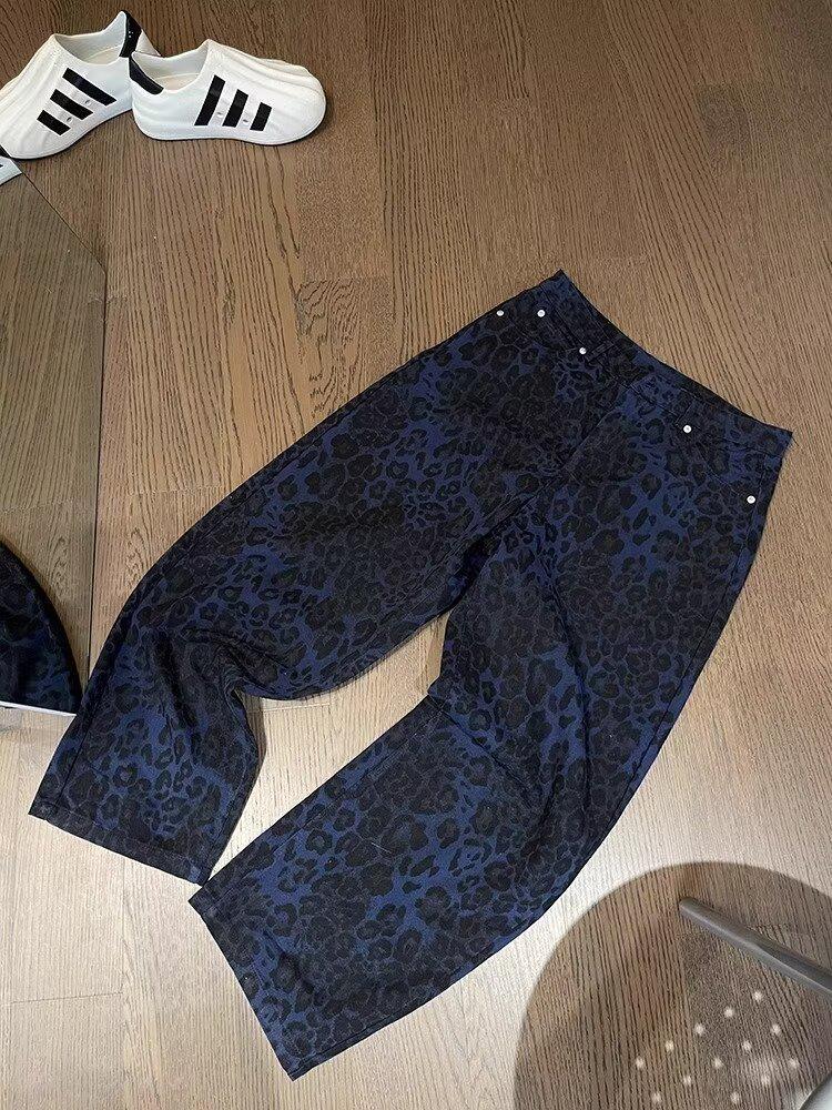 Americká vysoká pouliční móda: Pánské volné džíny s koženou výšivkou - Zimní trend, široký střih.