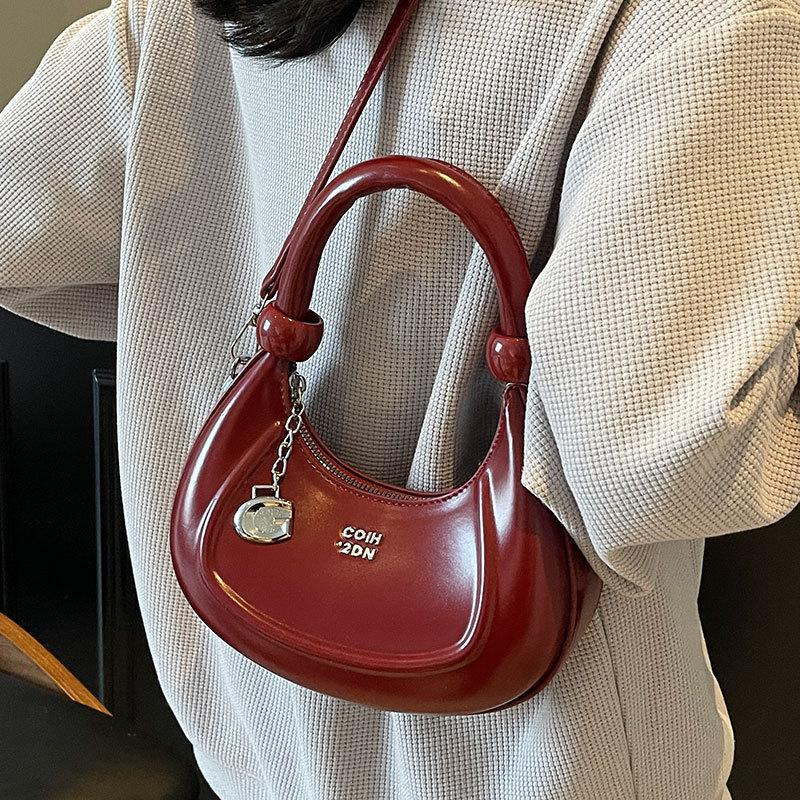 2025 New Fashion High Sense Niche Crescent Bag Women's Simple Temperament Versatile Commuter Oil Wax Leather Messenger Bag