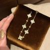 Xiaohongshu Golden Crushed Ice Laser Four-Leaf Clover Bracelet - Vintage Luxurious Stackable Hand Jewelry