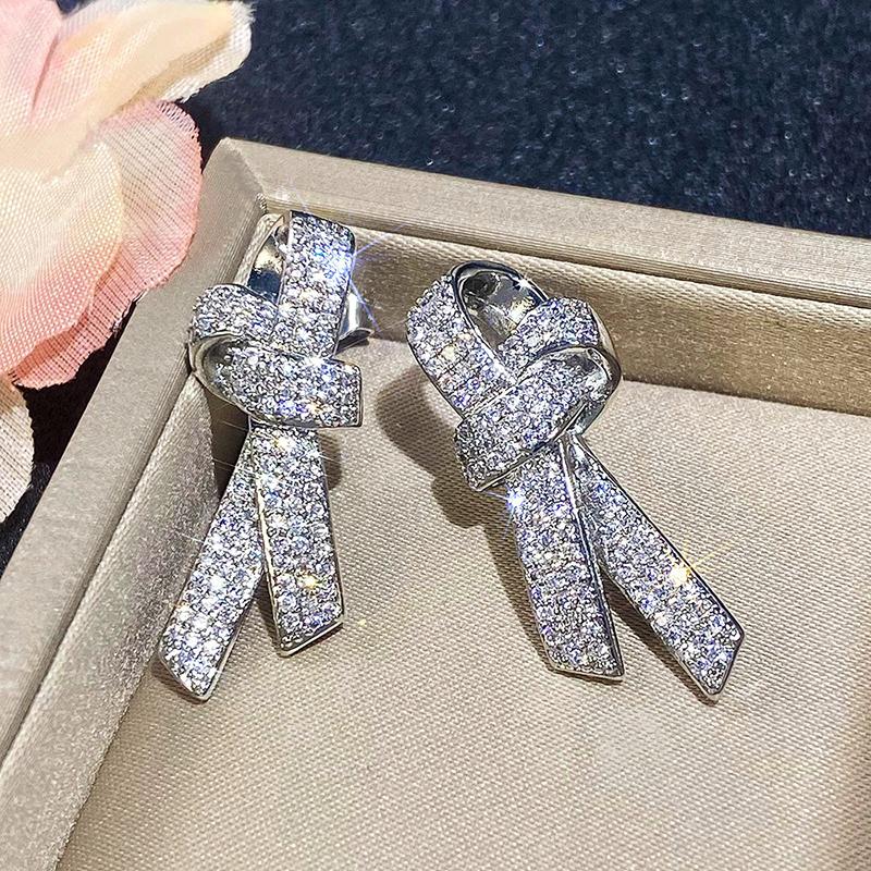 Huitan Bow Shaped Stud Earrings for Women Silver Color Sparkling Crystal Cubic Zirconia Temperament Accessories Female Jewelry