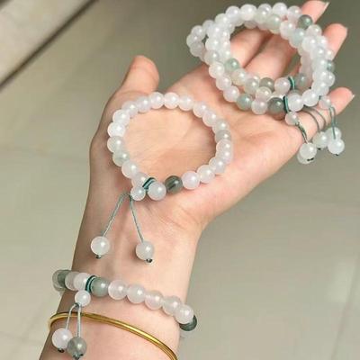 Damen Tianshan Goldseiden-Jade Armreif mit Weißem Schwebendem Blumendesign