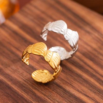 Conch Titanium Non-Fading Adjustable Women's Ring: Stainless Steel Band, 18K Gold Vacuum-Plated, Oil Pressed Design.