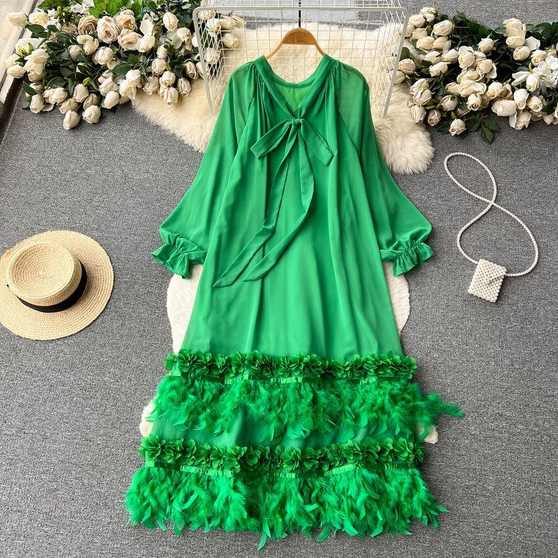 

Design Loose Heavy Industry Feather Tassel Long Sleeves Dress